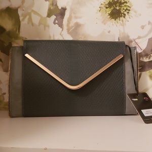 Grey mm leather embellished snakeskin clutch